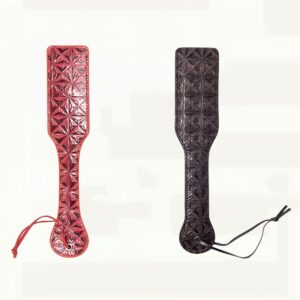 Geometrisesti kuvioitu paddle kahdessa värissä vierekkäin