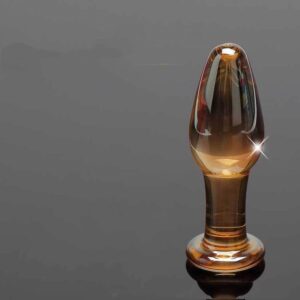 Lasinen anustappi meripihkan sävyssä, kompakti muoto ja leveä turvallinen pohja