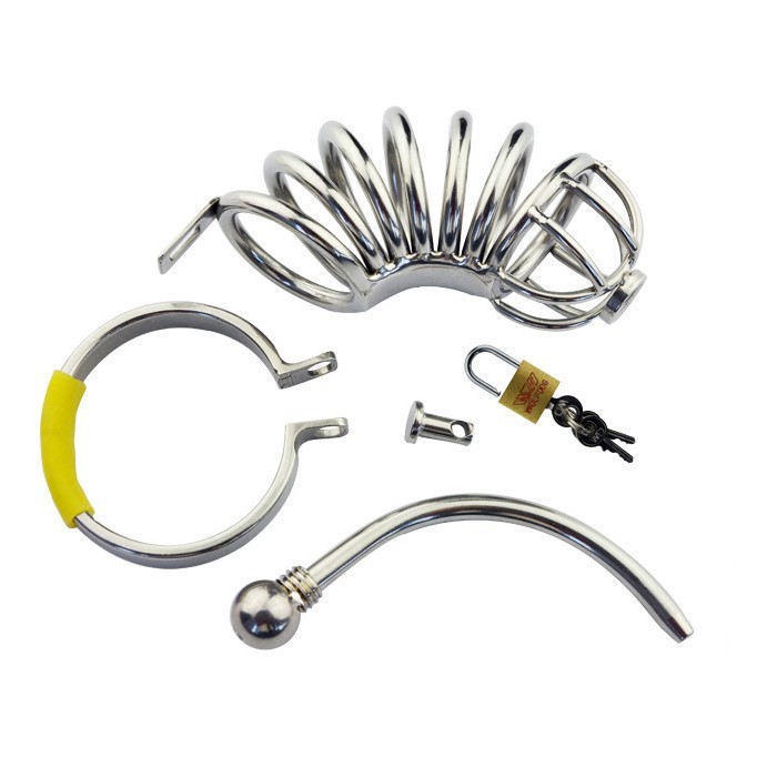 Wolf-Dog Stainless Steel Spiral Chastity Cage | Teräksinen siveyshäkki purettuna osiin